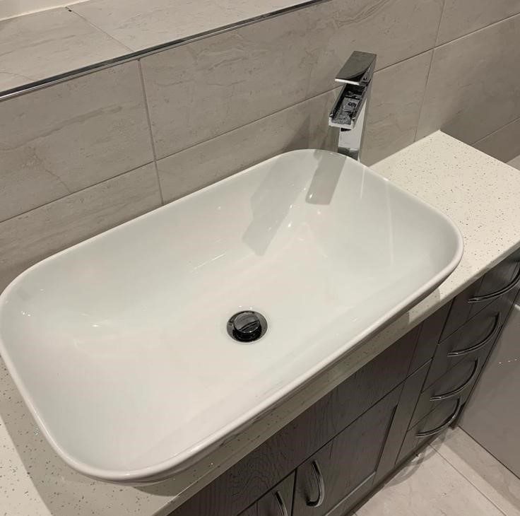 Contemporary basin and vanity unit by JWA Building Services