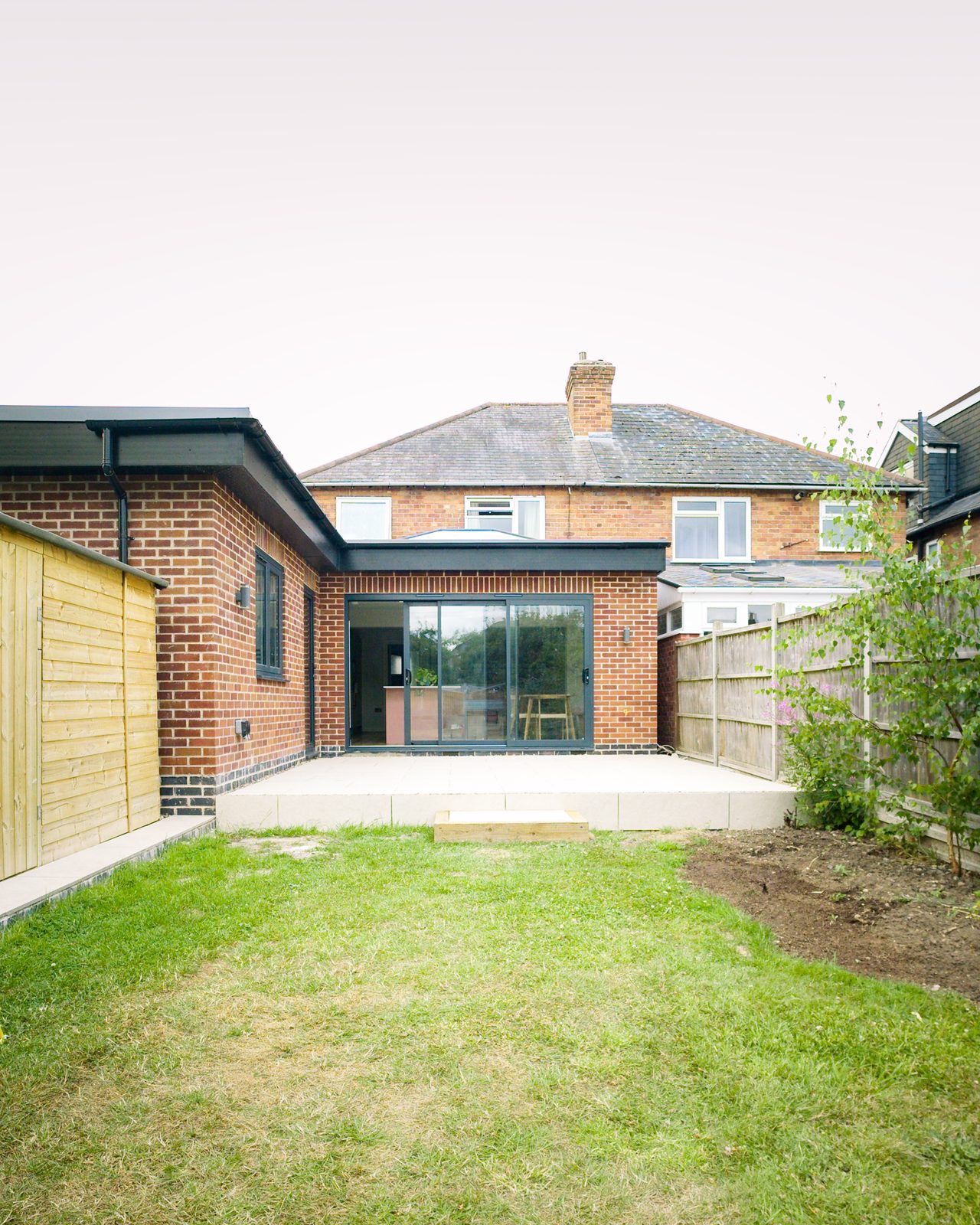 Rear extension with landscaped garden by JWA Building Services